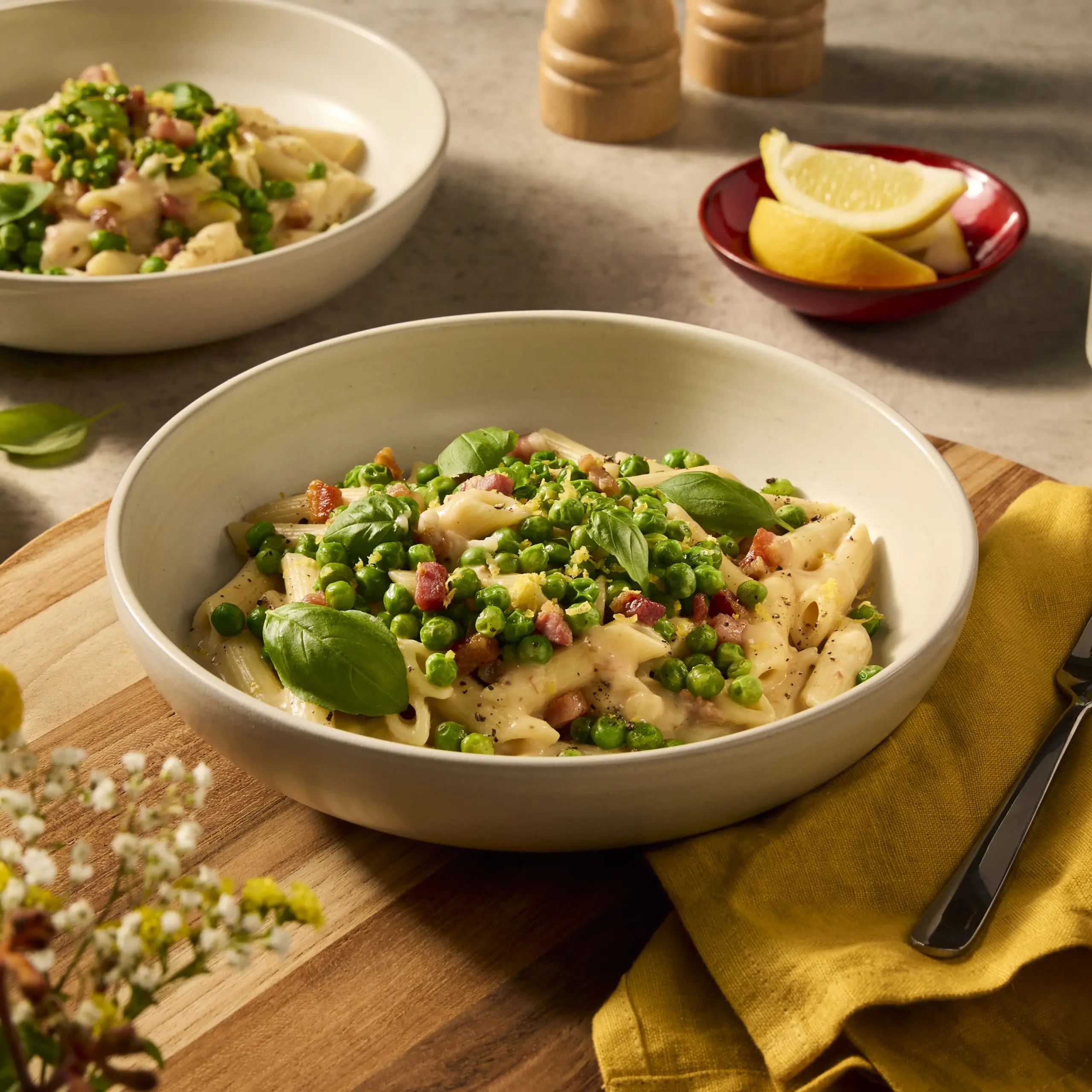 Recept Carbonara penne pasta met pancetta en tuinerwten Grand'Italia