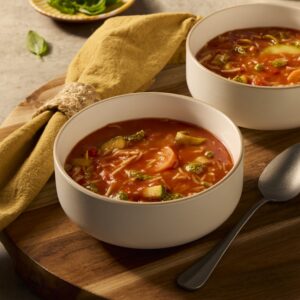 Recept Rijkgevulde Italiaanse tomatensoep met pesto Grand'Italia