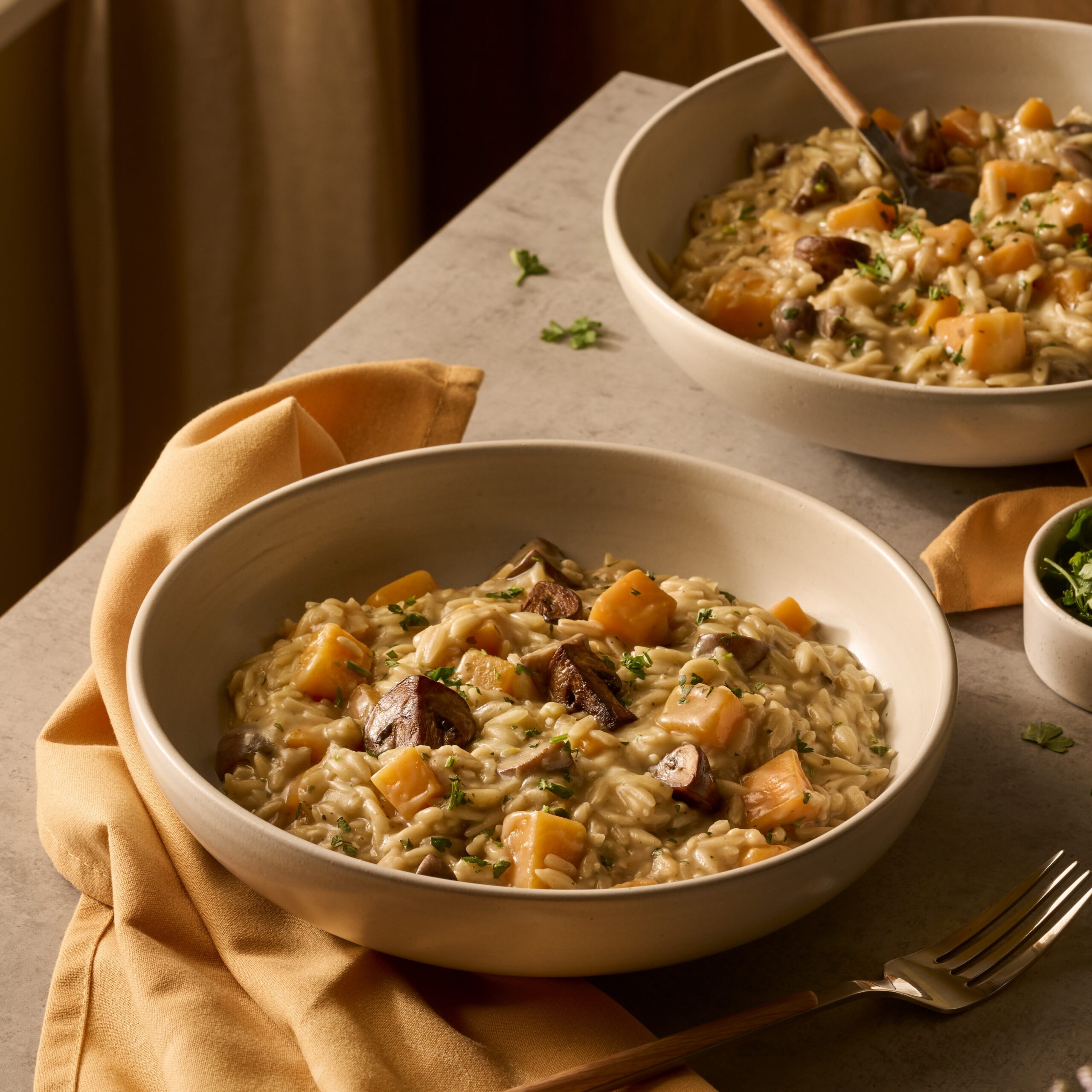 Volkoren orzotto met pompoen en kastanjechampignons